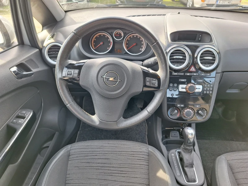 Opel Corsa 1.4 , снимка 7 - Автомобили и джипове - 52446111