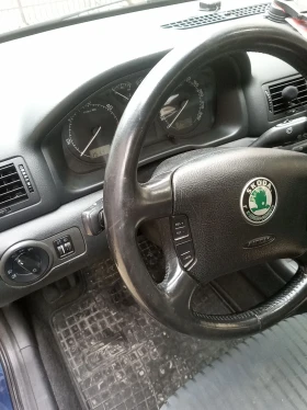 Skoda Octavia 1.9 TDI 110 к. с., снимка 11