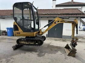 Багер Cat 301.4C - изображение 1
