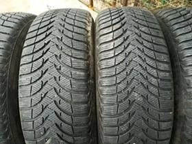 Гуми Зимни 215/65R16, снимка 2