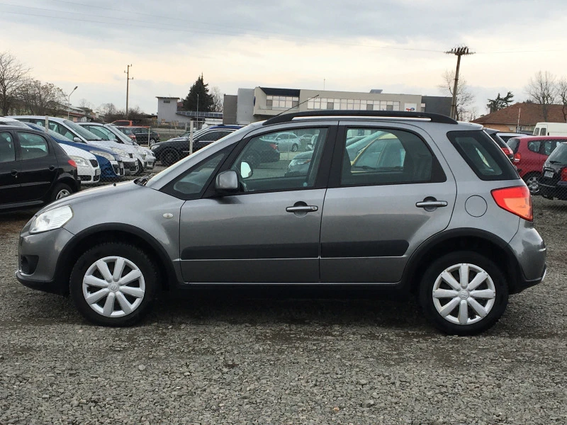 Suzuki SX4 1.6i SWISS, снимка 6 - Автомобили и джипове - 44854039