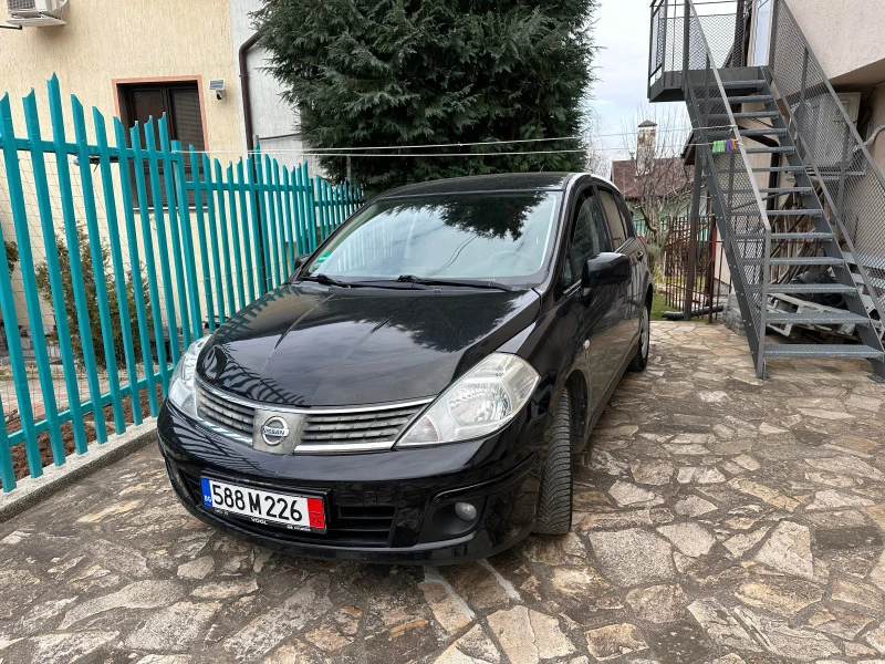 Nissan Tiida 1.8 от Германия, снимка 15 - Автомобили и джипове - 47115734