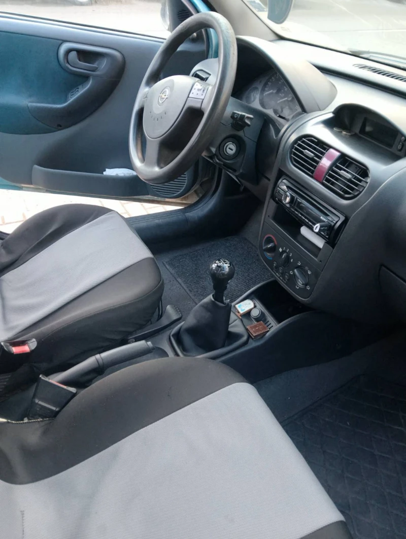 Opel Corsa, снимка 8 - Автомобили и джипове - 52886576