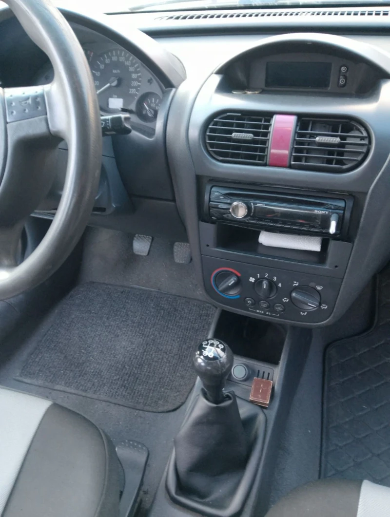 Opel Corsa, снимка 7 - Автомобили и джипове - 52886576