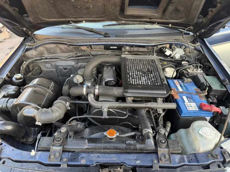 Mitsubishi L200, снимка 13 - Автомобили и джипове - 52830979