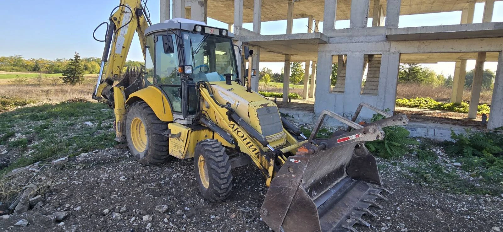 Багер New Holland LB110B-4PT