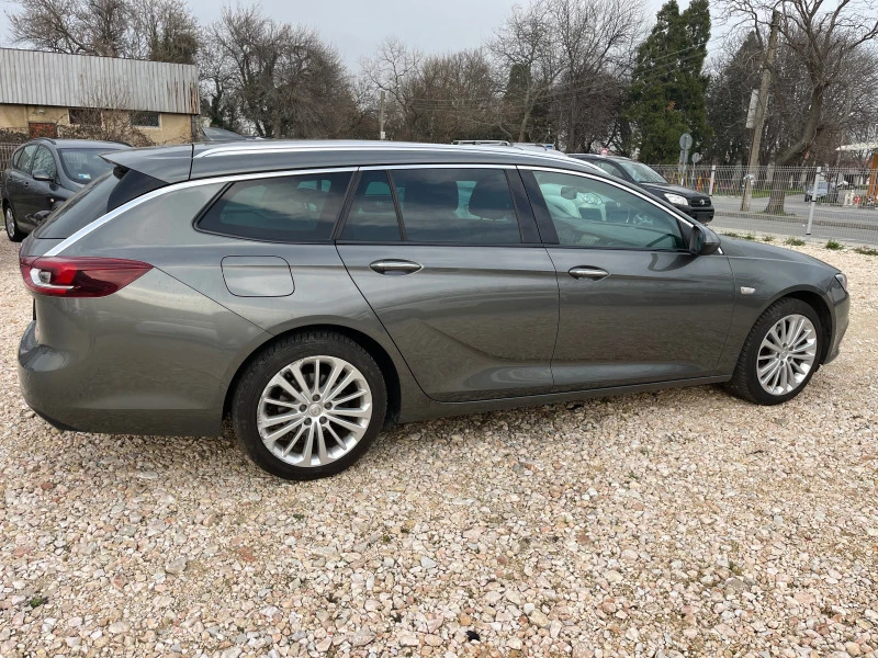 Opel Insignia Sports Tourer 170kc, снимка 2 - Автомобили и джипове - 44719528