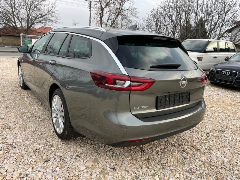 Opel Insignia Sports Tourer 170kc, снимка 3 - Автомобили и джипове - 44719528