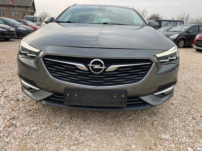 Opel Insignia Sports Tourer 170kc, снимка 15 - Автомобили и джипове - 44719528