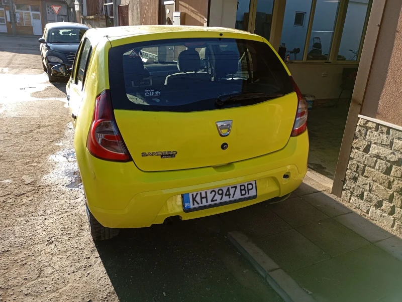 Dacia Sandero 1.4i газ, снимка 9 - Автомобили и джипове - 49027112