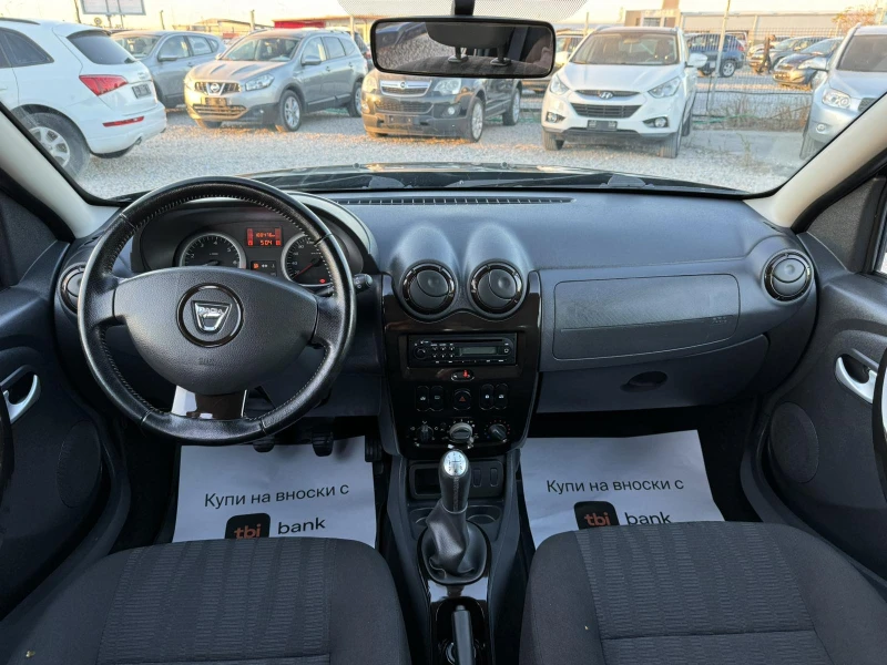 Dacia Duster 1.6I, снимка 9 - Автомобили и джипове - 47728419