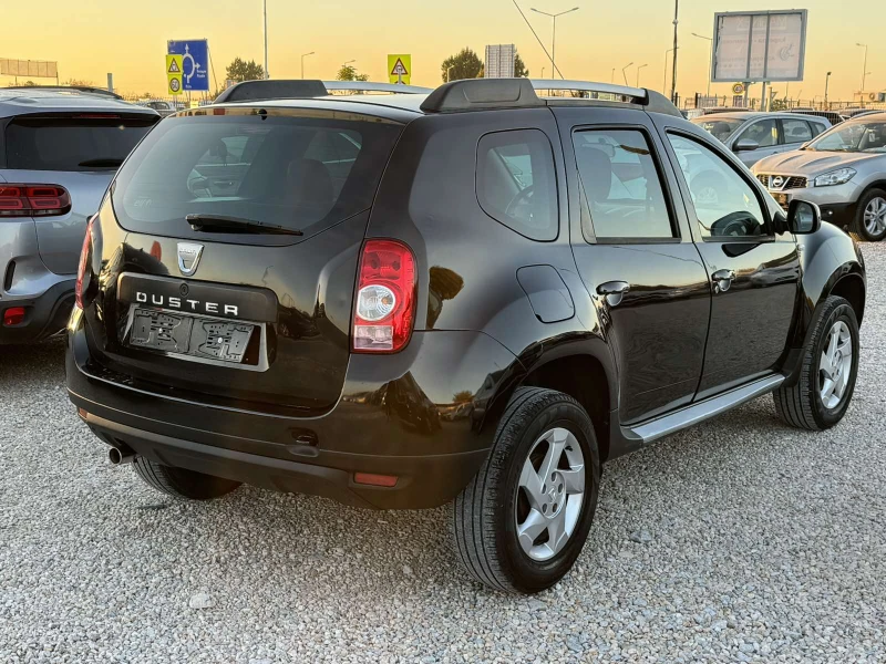 Dacia Duster 1.6I, снимка 4 - Автомобили и джипове - 47728419