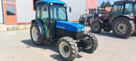 Трактор New Holland TN 85 - изображение 1