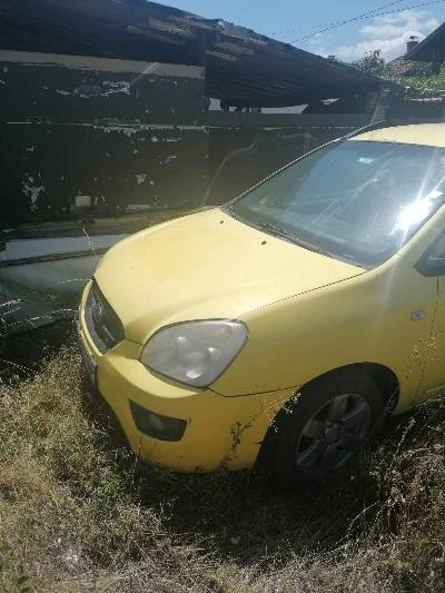 Kia Carens, снимка 3 - Автомобили и джипове - 52594427