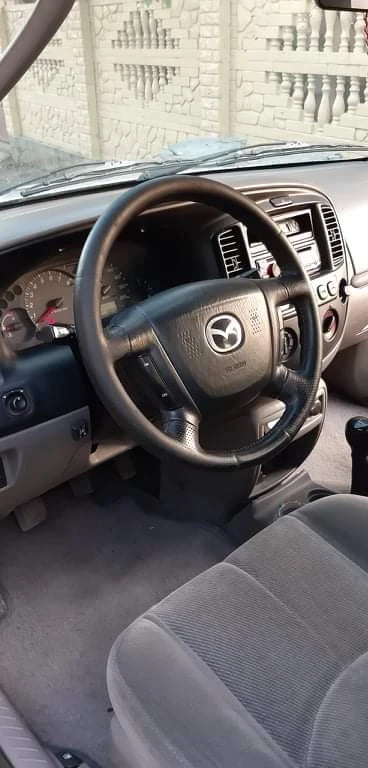 Mazda Tribute, снимка 6 - Автомобили и джипове - 47191764