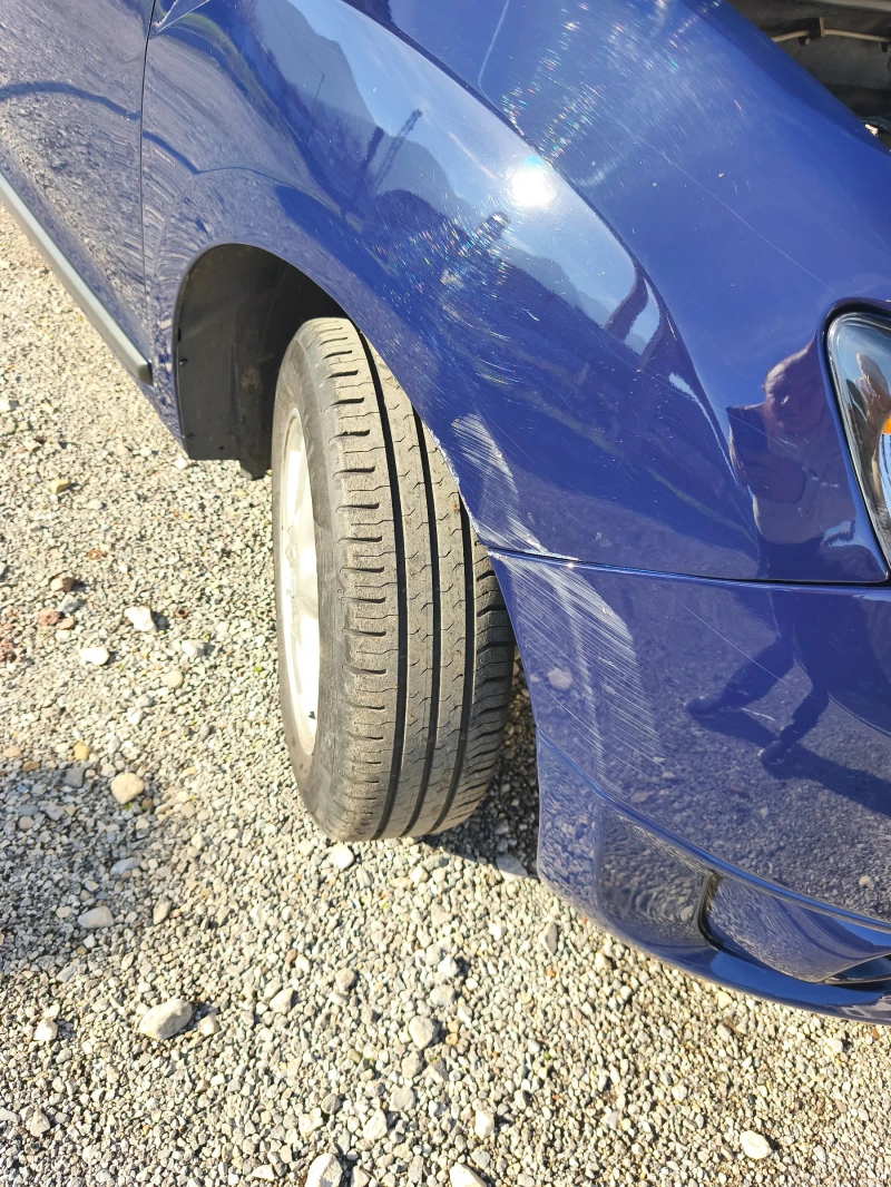 Dacia Logan, снимка 11 - Автомобили и джипове - 52725608