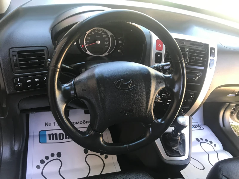 Hyundai Tucson 2.0 ЧИСТО НОВ 4?4, снимка 8 - Автомобили и джипове - 50973588