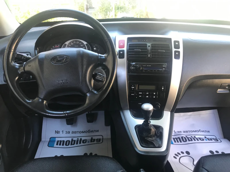 Hyundai Tucson 2.0 ЧИСТО НОВ 4?4, снимка 13 - Автомобили и джипове - 50973588