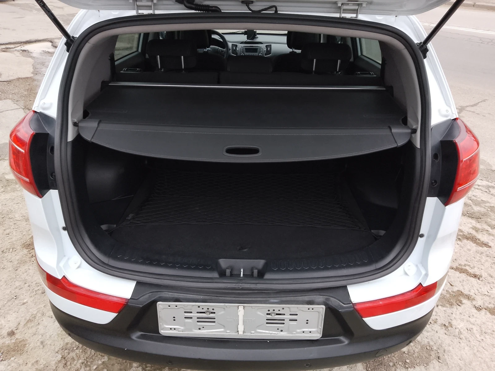 Kia Sportage 1.7 CRDI/НАПЪЛНО ОБСЛУЖЕНА, снимка 15 - Автомобили и джипове - 54165411