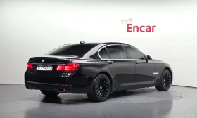 BMW 750 MONITORI\REALNI KM, снимка 2