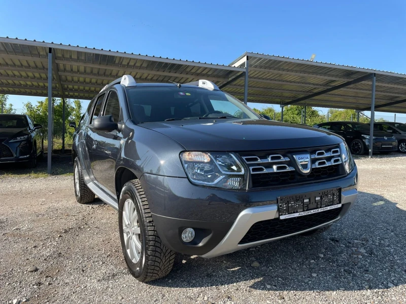 Dacia Duster 1.6i 4x4, снимка 1 - Автомобили и джипове - 47561258