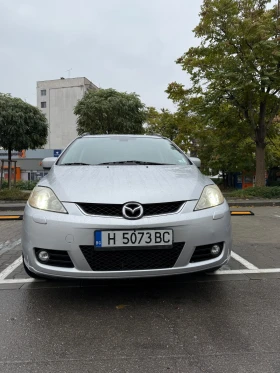 Обява за продажба на Mazda 5 2, 0i 145ps 7 местен ксенон пдгрев на седалки ~6 900 лв. - изображение 2 | Auto.bg Обява за продажба на Mazda 5 2, 0i 145ps 7 местен ксенон пдгрев на седалки ~6 900 лв. - изображение 2