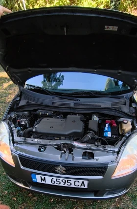 Suzuki Swift 1.3 68 k.с., снимка 11
