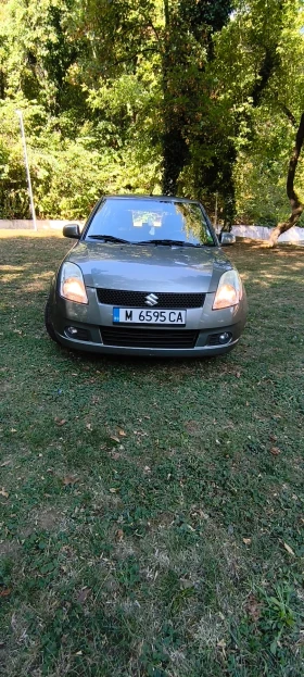 Suzuki Swift 1.3 68 k.с., снимка 1
