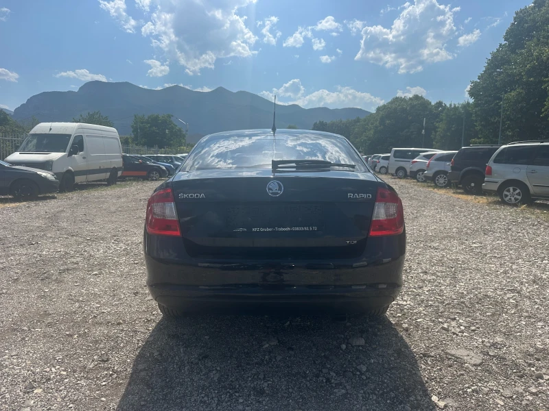 Skoda Rapid 1.6TDI 105kc EVRO5, снимка 4 - Автомобили и джипове - 51108114