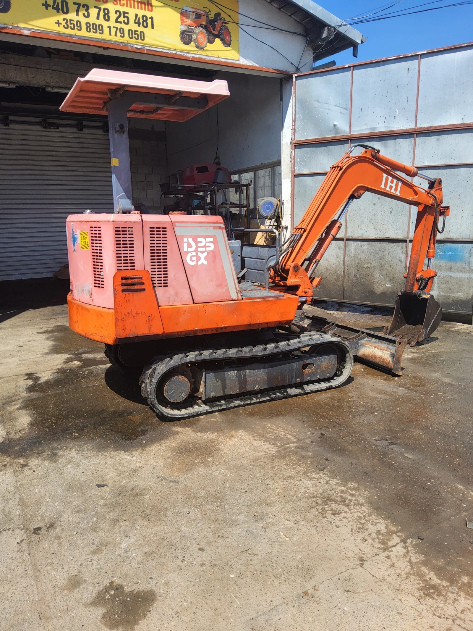 Багер Kubota 25