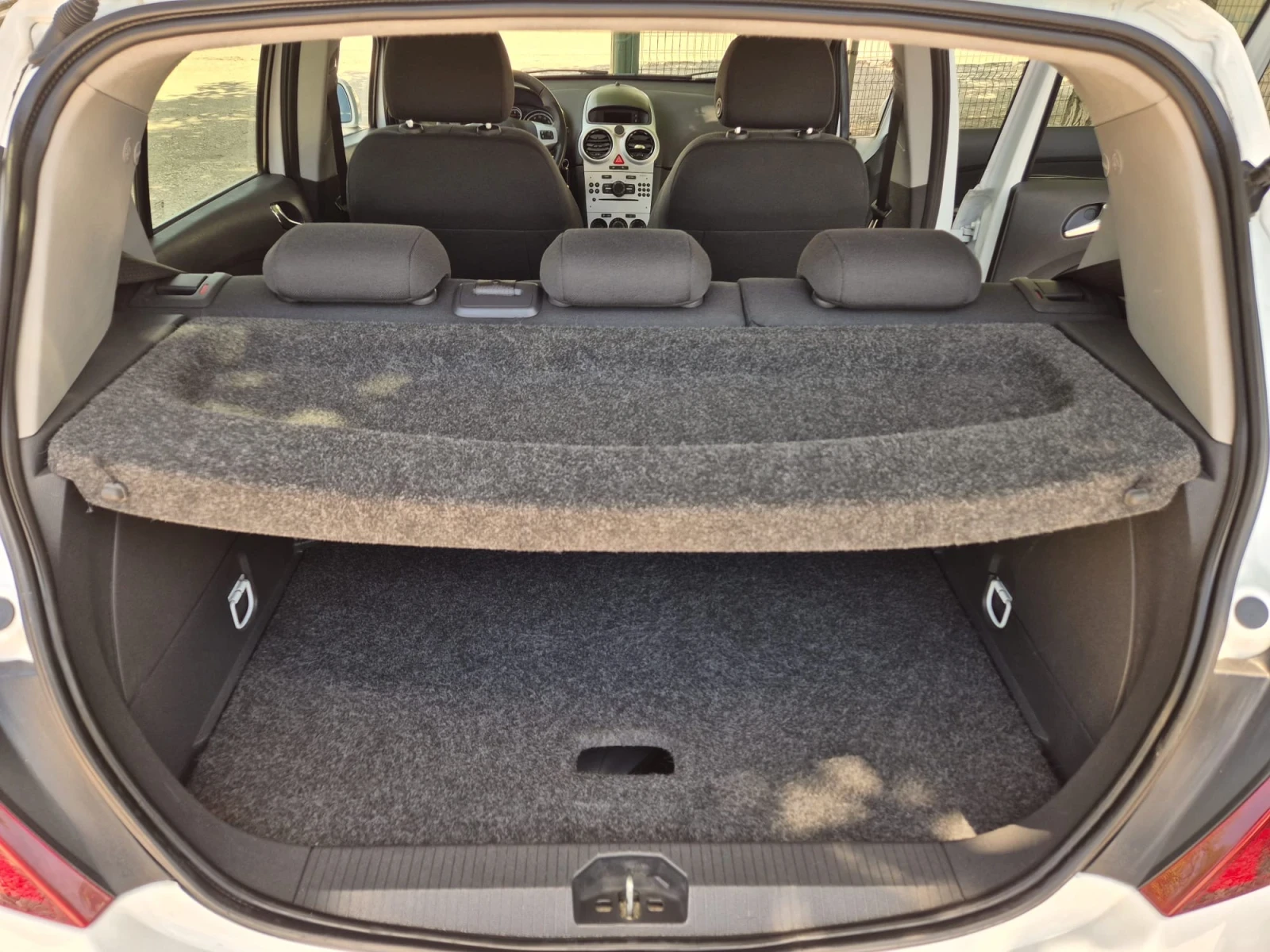 Opel Corsa 1.4i-90кс, снимка 14 - Автомобили и джипове - 54711004