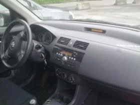 Suzuki Swift 1.3i / 1.3MJet, снимка 15