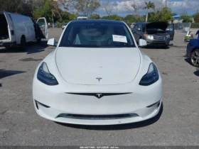 Tesla Model Y * LONG RANGE* DUAL MOTOR* AWD*  - 15300 € / 29924.20 лв. - 94160618 11