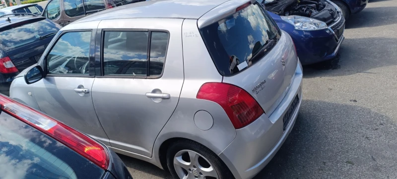 Suzuki Swift 1.3i / 1.3MJet, снимка 11 - Автомобили и джипове - 20567373