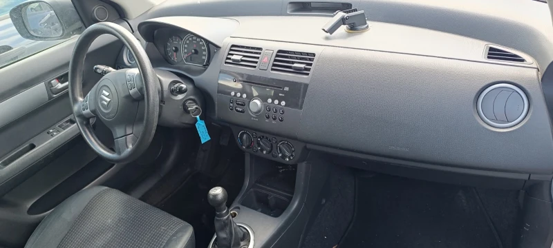 Suzuki Swift 1.3i / 1.3MJet, снимка 14 - Автомобили и джипове - 20567373