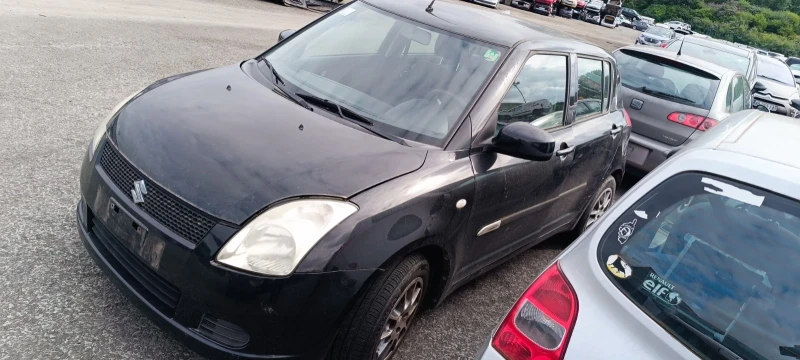 Suzuki Swift 1.3i / 1.3MJet, снимка 7 - Автомобили и джипове - 20567373