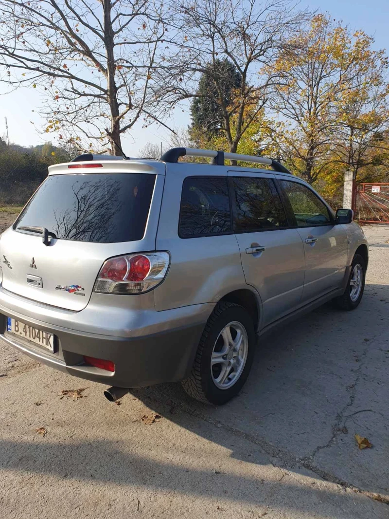Mitsubishi Outlander, снимка 13 - Автомобили и джипове - 52465901