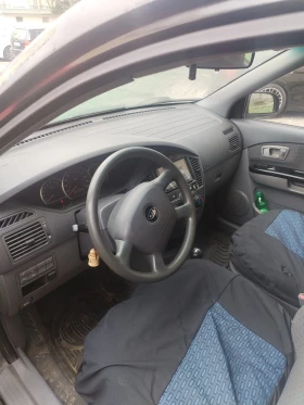 Kia Carens, снимка 5