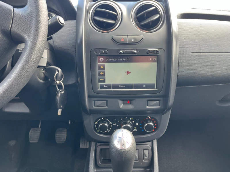 Dacia Duster 1.6 газ, 06/2014, нави, блутут, снимка 9 - Автомобили и джипове - 45555079