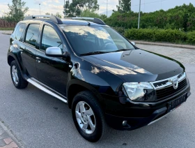 Dacia Duster 1.6i/16V/6ck/4x4/* Климатик* /150715км/Серв.истори, снимка 3
