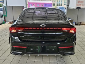     Kia K5      .   