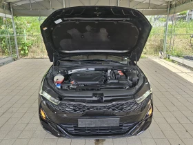     Kia K5      .   