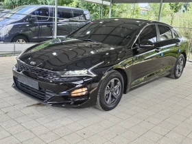     Kia K5      .   
