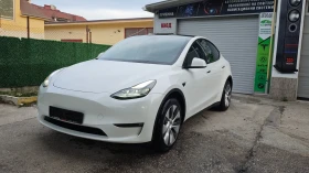 ������ Tesla Model Y