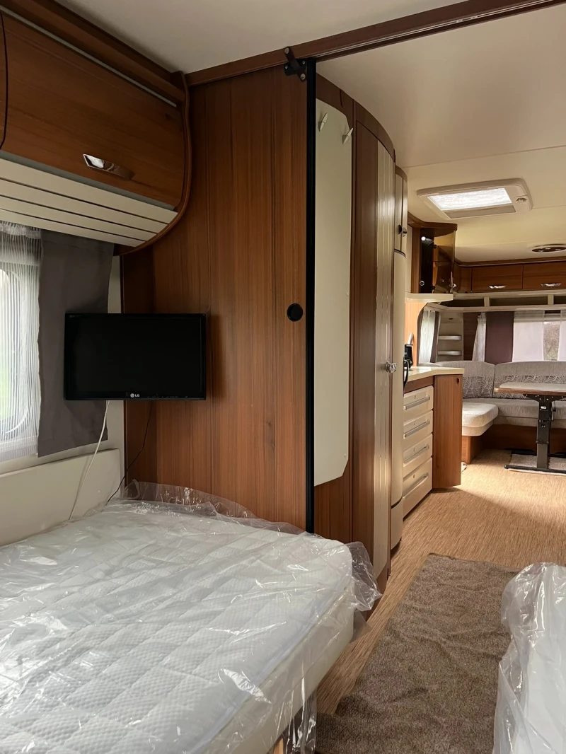 Каравана Hobby PREMIUM 720 UML, снимка 13 - Каравани и кемпери - 52879532