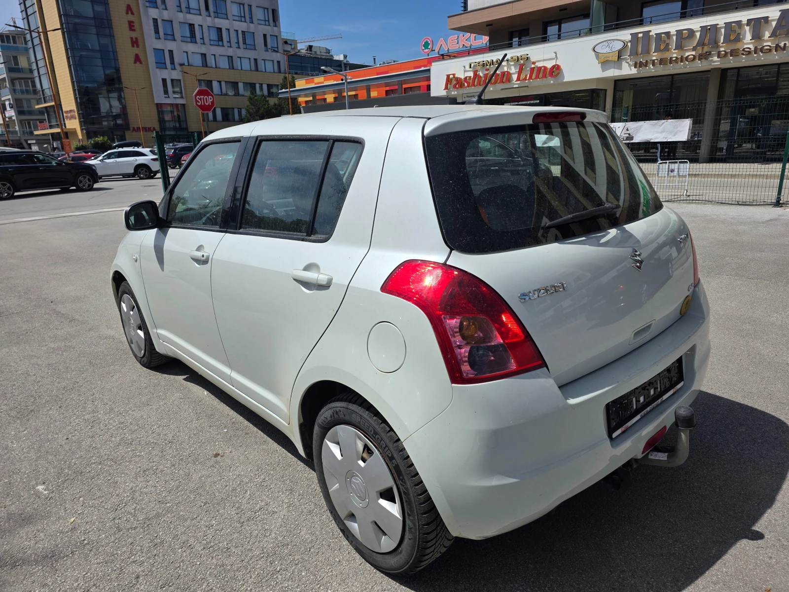 Suzuki Swift 1.3 4х4, снимка 7 - Автомобили и джипове - 54518727