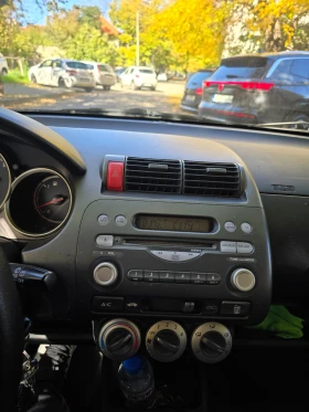 Обява за продажба на Honda Jazz 1.2 бензин 68 кс. Клима ~5 900 лв. - изображение 7 | Auto.bg Обява за продажба на Honda Jazz 1.2 бензин 68 кс. Клима ~5 900 лв. - изображение 7