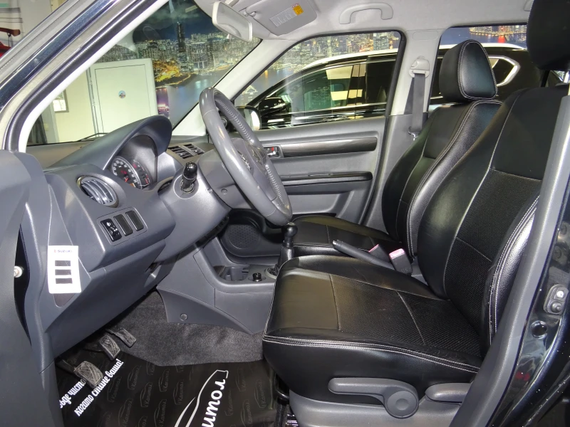 Suzuki Swift 1.3 I 90КС, снимка 7 - Автомобили и джипове - 53597425