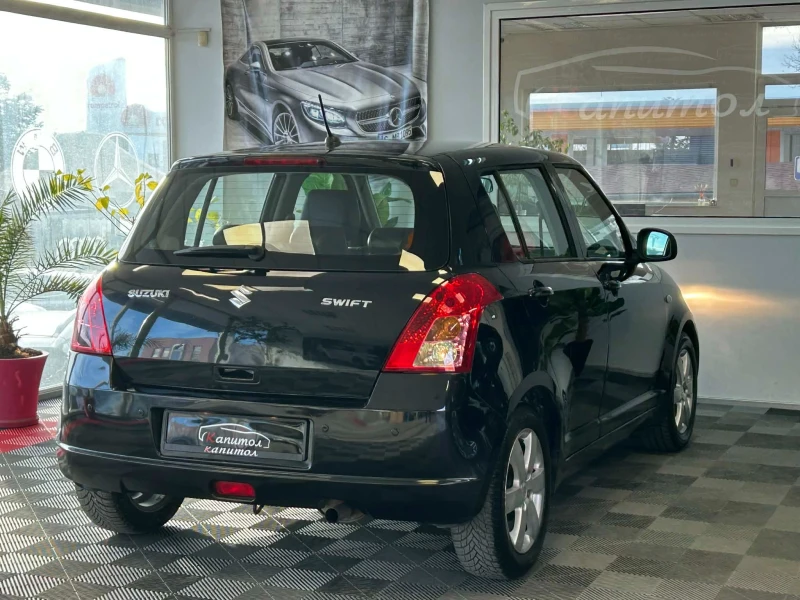 Suzuki Swift 1.3 I 90КС, снимка 6 - Автомобили и джипове - 53597425
