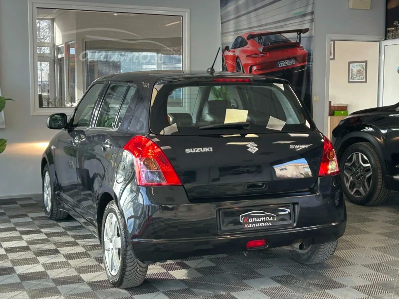 Suzuki Swift 1.3 I 90КС, снимка 4 - Автомобили и джипове - 53597425